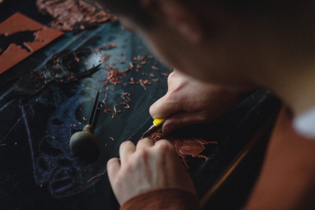 an artist carving