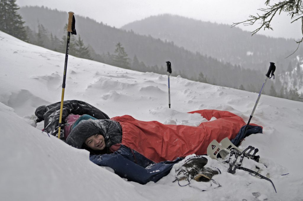camping outdoors in the snow