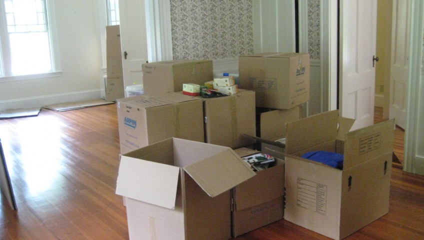 a home packed up into storage boxes