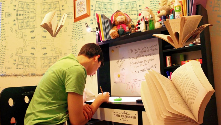 a student in a messy dorm