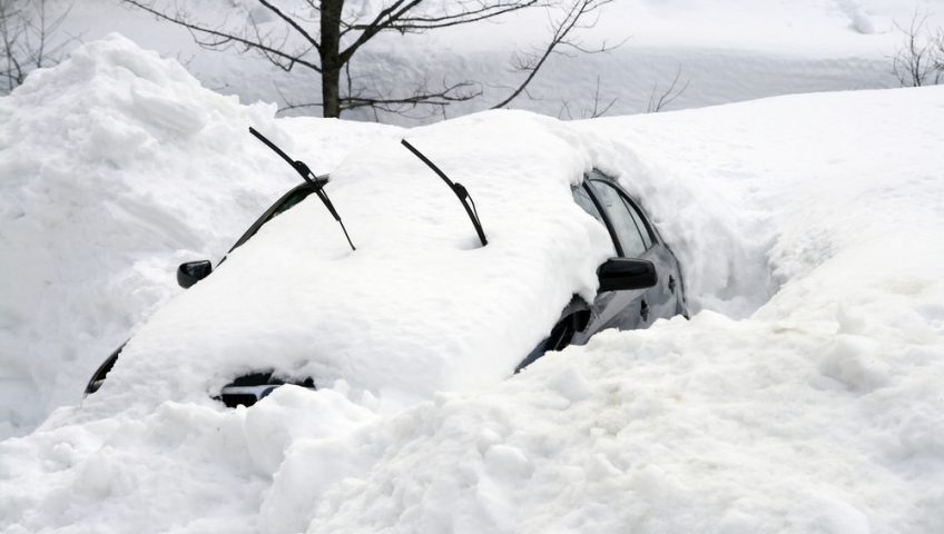 car buries in snow
