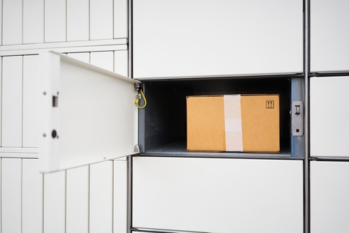 Open Locker With Cardboard Box Inside - Business Mailboxes